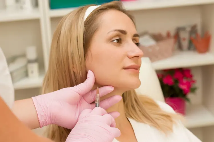 Masseter muscle being assessed before Botox in a Hobart clinic